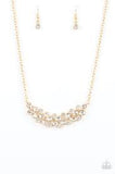 Paparazzi Special Treatment - Gold Necklace and matching earrings
